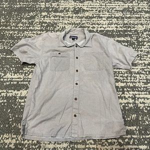 Patagonia button front shirt grey with white polka dots.